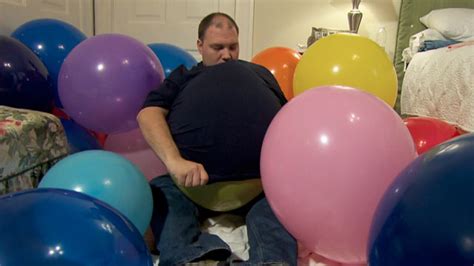 man in love with balloons